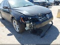 2014 Volkswagen Passat — photo 6 of 16 | VIN 1VWCN7A3XEC028665