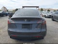 2023 Tesla Model Y — photo 18 of 18 | VIN 7SAYGAEE9PF904193