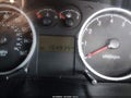 2008 Hyundai Tiburon — photo 7 of 12 | VIN KMHHN66F98U288099