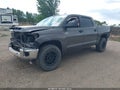 2014 Toyota Tundra — photo 2 of 17 | VIN 5TFDY5F19EX377383