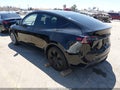 2023 Tesla Model Y — photo 3 of 18 | VIN 7SAYGDEE4PA079159
