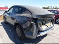2026 Tesla Model Y — photo 3 of 17 | VIN 7SAYGDED7TA601137