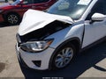 2013 Mazda CX-5 — photo 13 of 18 | VIN JM3KE4DE5D0158189