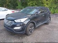 2014 Hyundai Santa Fe — photo 2 of 10 | VIN 5XYZUDLB0EG209496
