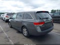 2014 Honda Odyssey — photo 3 of 17 | VIN 5FNRL5H43EB104901