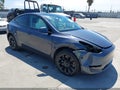 2023 Tesla Model Y — photo 1 of 19 | VIN 7SAYGDEE6PF624023