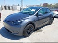 2023 Tesla Model Y — photo 2 of 19 | VIN 7SAYGDEE6PF624023