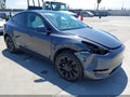 2023 Tesla Model Y — photo 6 of 19 | VIN 7SAYGDEE6PF624023