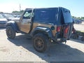 2015 Jeep Wrangler — photo 3 of 17 | VIN 1C4AJWAG7FL682625