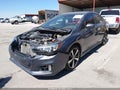 2017 Subaru Impreza — photo 2 of 18 | VIN 4S3GKAK67H3614649