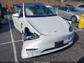 2023 Tesla Model Y — photo 14 of 19 | VIN 7SAYGAEE2PF773043