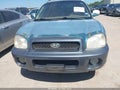 2001 Hyundai Santa Fe — photo 6 of 11 | VIN KM8SC83DX1U128538