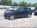 2017 Kia Sportage — photo 14 of 16 | VIN KNDPMCAC1H7261122