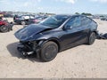 2026 Tesla Model Y — photo 2 of 23 | VIN 7SAYGDEE1TA681253