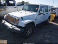 2015 Jeep Wrangler Unlimited — photo 2 of 16 | VIN 1C4BJWEG0FL674753