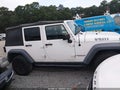 2016 Jeep Wrangler Unlimited — photo 13 of 16 | VIN 1C4BJWDG4GL143526