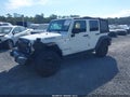 2016 Jeep Wrangler Unlimited — photo 2 of 16 | VIN 1C4BJWDG4GL143526