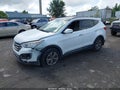 2016 Hyundai Santa Fe — photo 2 of 16 | VIN 5XYZUDLB7GG353940