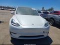 2022 Tesla Model Y — photo 10 of 14 | VIN 7SAYGDEE7NA010804