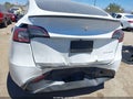 2022 Tesla Model Y — photo 6 of 14 | VIN 7SAYGDEE7NA010804