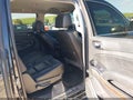 2016 Chevrolet Suburban — photo 8 of 16 | VIN 1GNSCHKC8GR438509