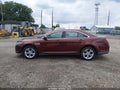 2015 Ford Taurus — photo 14 of 16 | VIN 1FAHP2E89FG174079