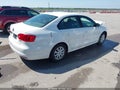 2014 Volkswagen Jetta — photo 4 of 17 | VIN 3VW2K7AJ5EM228452