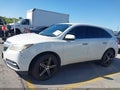 2016 Acura MDX — photo 14 of 16 | VIN 5FRYD3H40GB014314