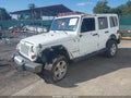2011 Jeep Wrangler Unlimited — photo 2 of 15 | VIN 1J4BA5H17BL598101