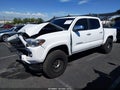 2018 Toyota Tacoma — photo 14 of 16 | VIN 3TMGZ5AN7JM161567