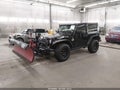 2008 Jeep Wrangler — photo 2 of 11 | VIN 1J4GA64178L644021
