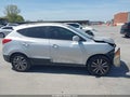 2011 Hyundai Tucson — photo 14 of 18 | VIN KM8JU3AC2BU194203