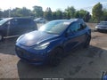 2021 Tesla Model Y — photo 2 of 19 | VIN 5YJYGDEE1MF099641