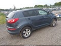 2013 Kia Sportage — photo 4 of 11 | VIN KNDPBCA26D7380906