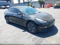 2019 Tesla Model 3 — photo 1 of 18 | VIN 5YJ3E1EA5KF399384