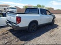 2023 Honda Ridgeline — photo 4 of 10 | VIN 5FPYK3F89PB052662