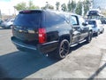 2013 Chevrolet Suburban — photo 4 of 18 | VIN 1GNSKKE74DR120266