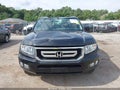 2010 Honda Ridgeline — photo 12 of 16 | VIN 5FPYK1F5XAB006839