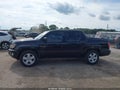 2010 Honda Ridgeline — photo 14 of 16 | VIN 5FPYK1F5XAB006839