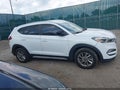 2017 Hyundai Tucson — photo 14 of 17 | VIN KM8J3CA48HU553557