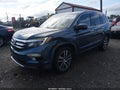 2016 Honda Pilot — photo 2 of 17 | VIN 5FNYF6H97GB048128