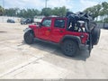 2014 Jeep Wrangler Unlimited — photo 3 of 20 | VIN 1C4HJWDG8EL135663