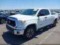 2014 Toyota Tundra — photo 2 of 16 | VIN 5TFRY5F17EX161957