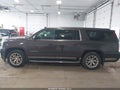 2015 GMC Yukon XL — photo 14 of 16 | VIN 1GKS2GKCXFR118925