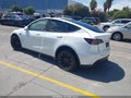 2023 Tesla Model Y — photo 3 of 19 | VIN 7SAYGDEE6PF635426