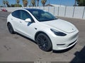 2022 Tesla Model Y — photo 1 of 18 | VIN 7SAYGDEF1NF491127