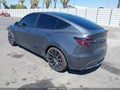 2023 Tesla Model Y — photo 3 of 19 | VIN 7SAYGDEF5PF738412