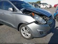 2010 Hyundai Tucson — photo 11 of 16 | VIN KM8JU3AC5AU109644
