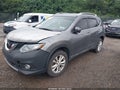 2015 Nissan Rogue — photo 2 of 12 | VIN 5N1AT2MV4FC880278