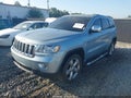 2013 Jeep Grand Cherokee — photo 2 of 16 | VIN 1C4RJECG2DC610576